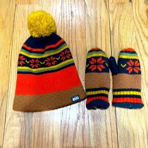 REI matching kid’s Pom Pom hat and mittens